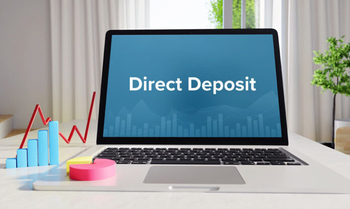 Direct Deposit – Statistics/Business. Laptop in the office wit